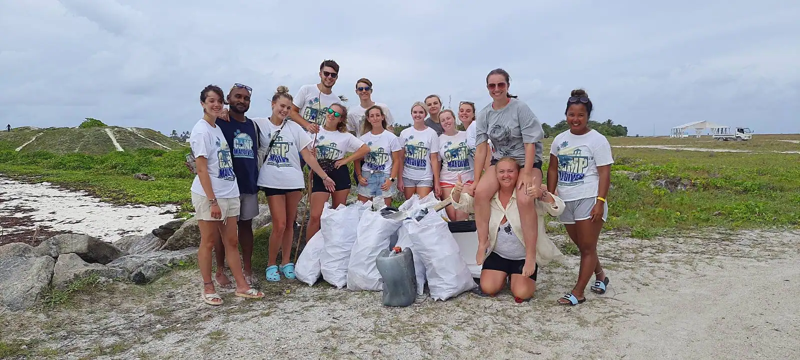 Dive team collecting plastic during a reef clean-up in Rasdhoo