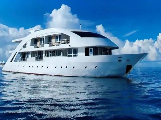 Maldives liveaboard dive boat anchored at a remote atoll